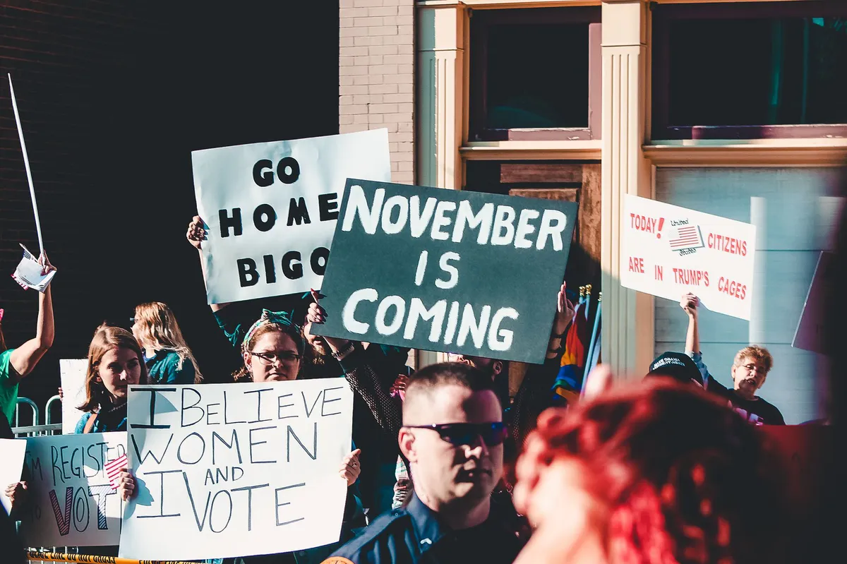 political rally with signs