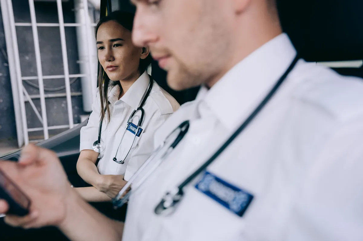 medical professionals discussing compliance