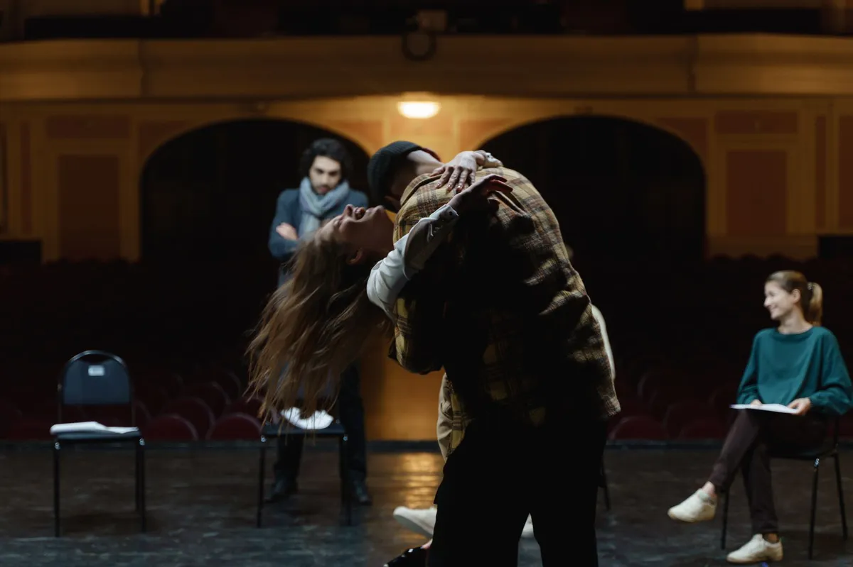 actors rehearsing on stage