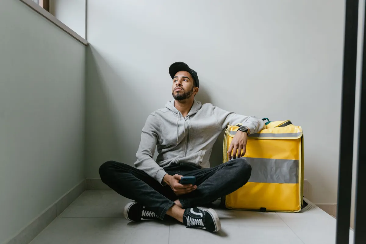 delivery driver with food bag