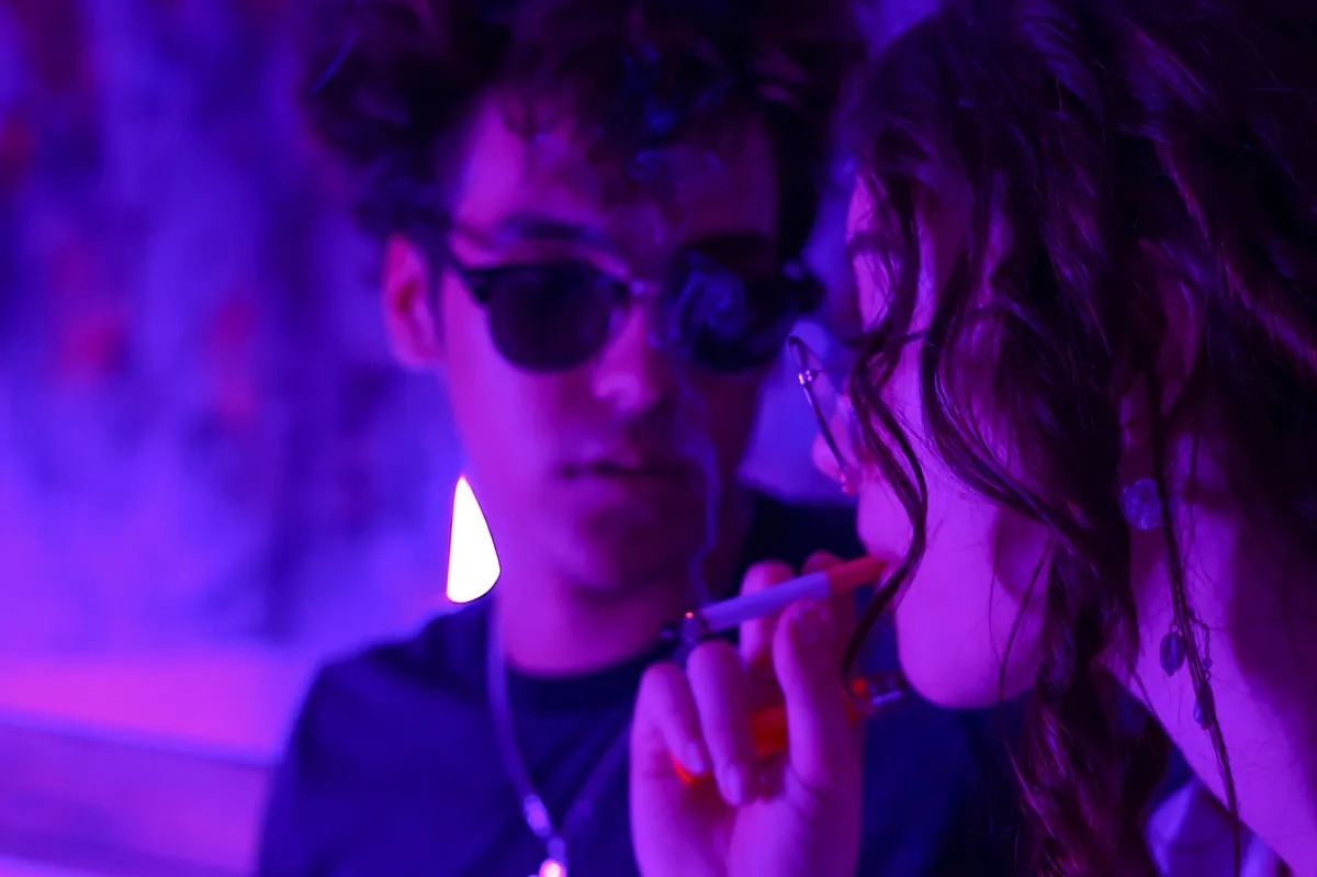 young adults using vapes