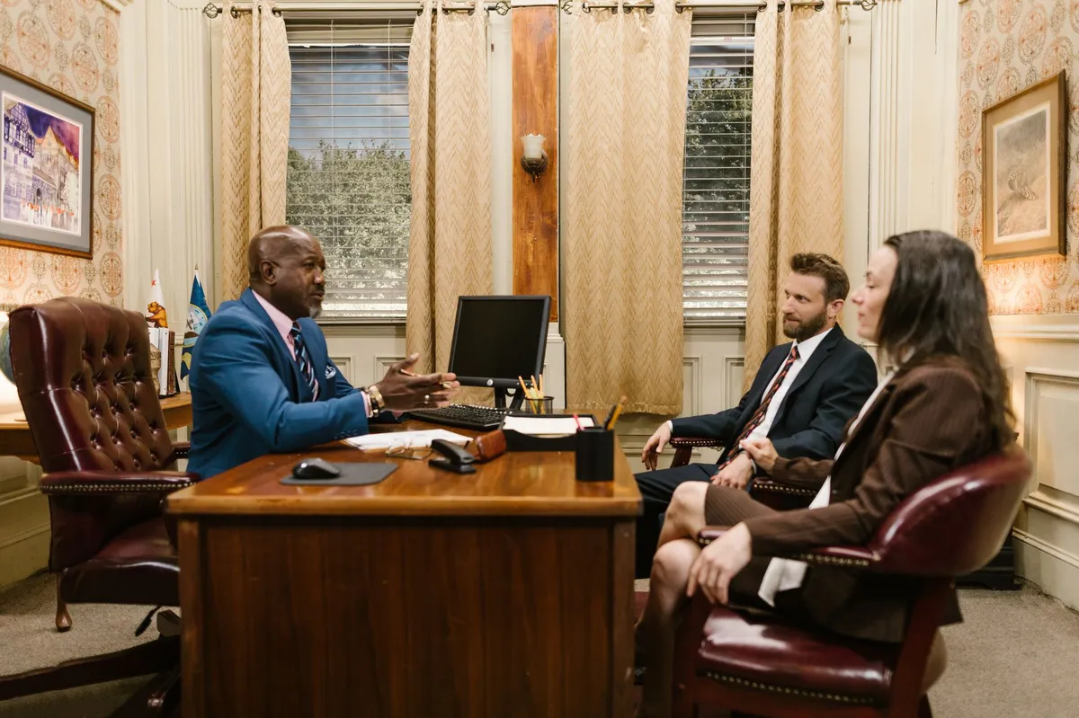 attorney consulting with client