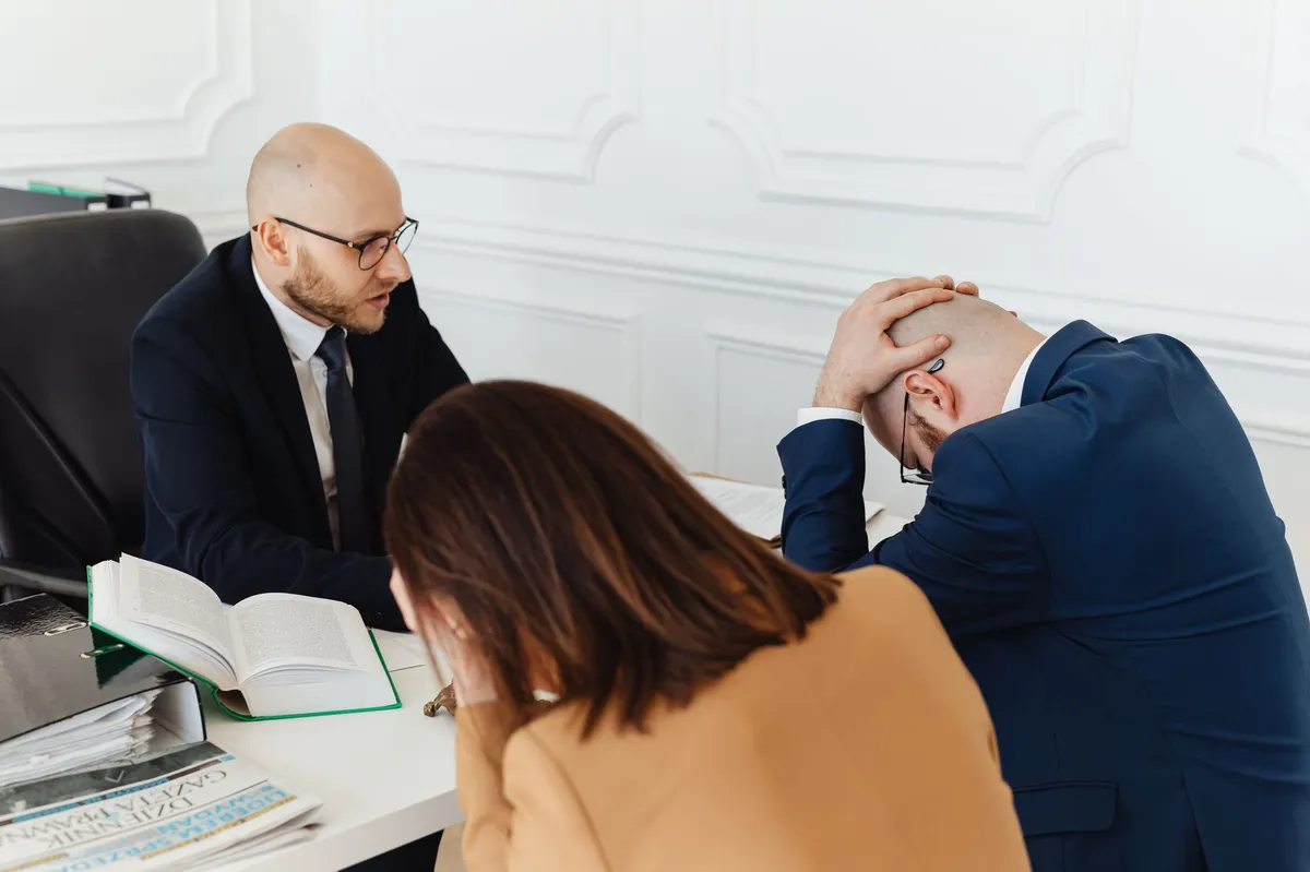worried client in law office