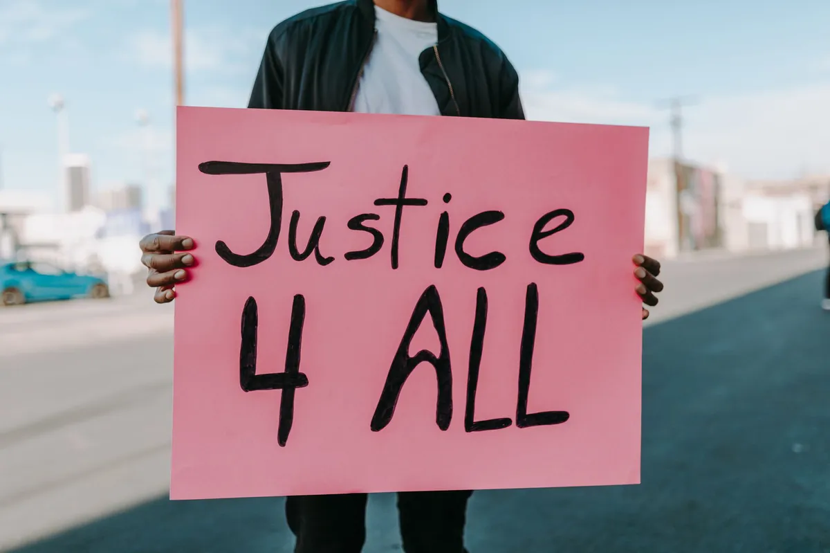 protest sign justice for Corey