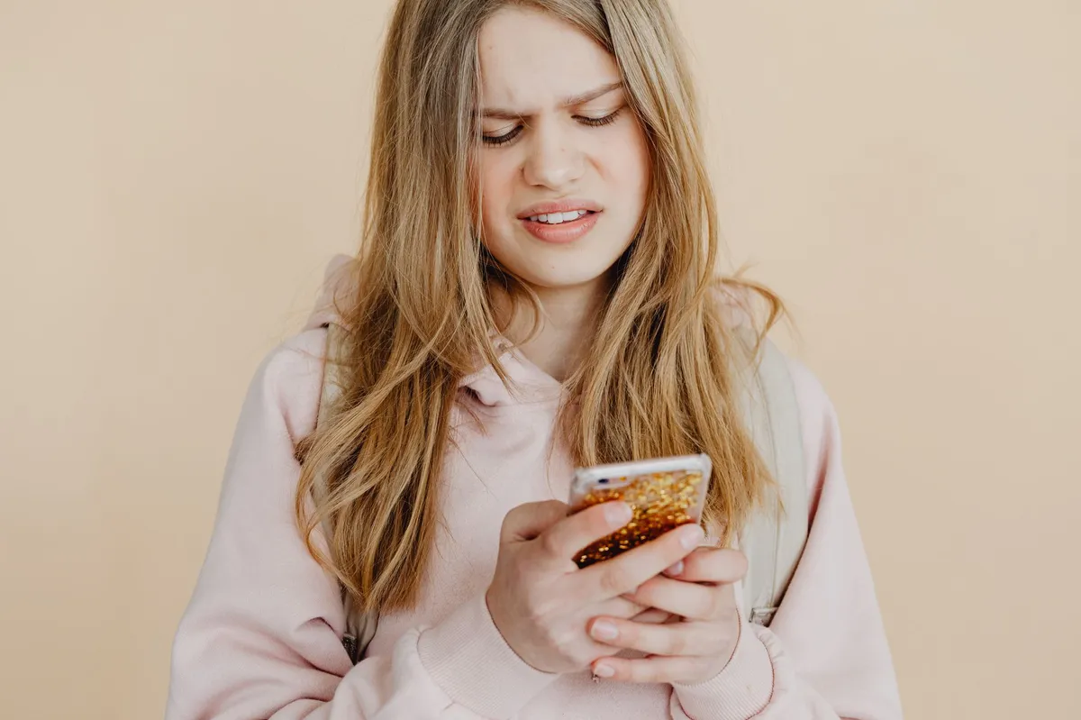 distressed teen texting