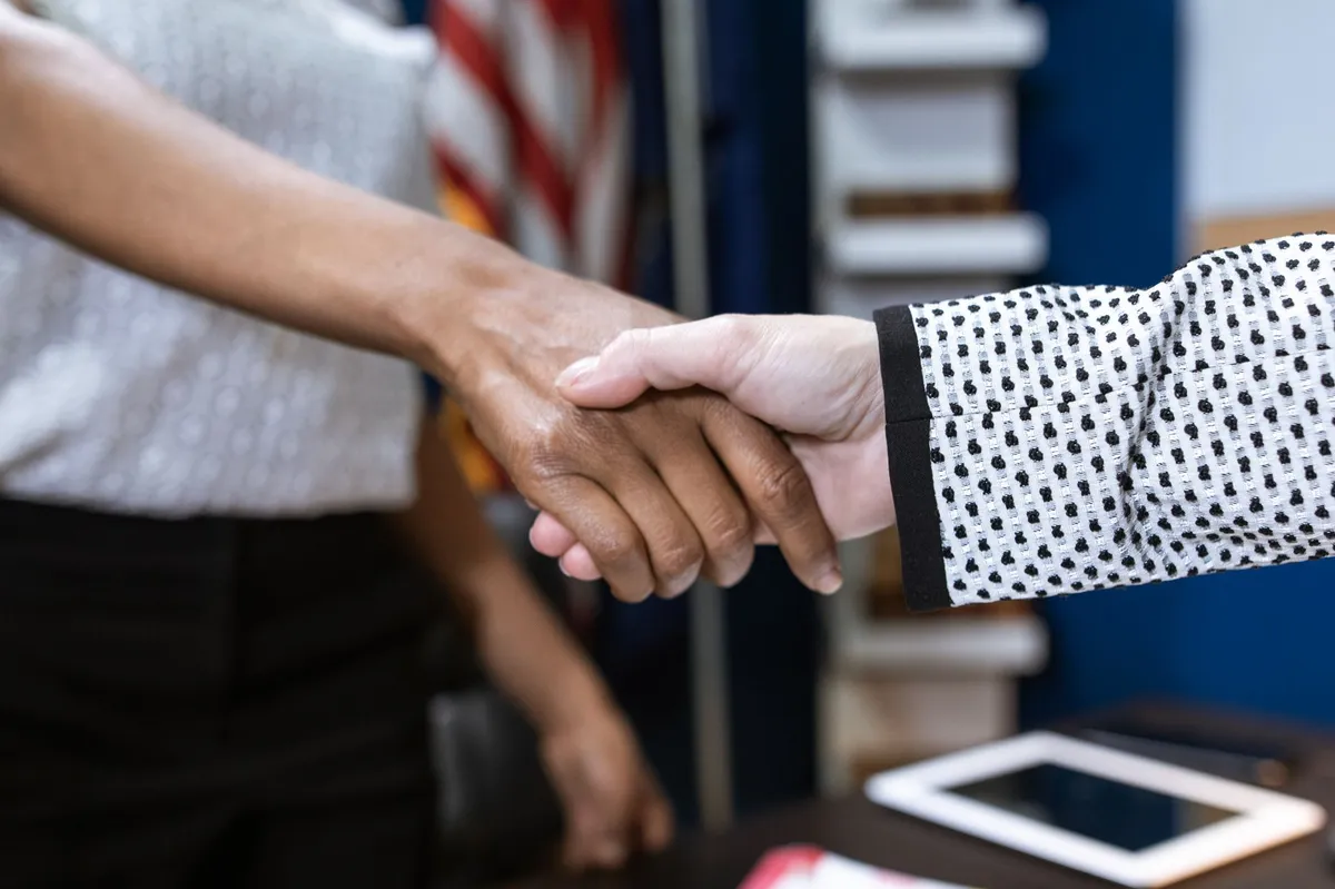 handshake after settlement