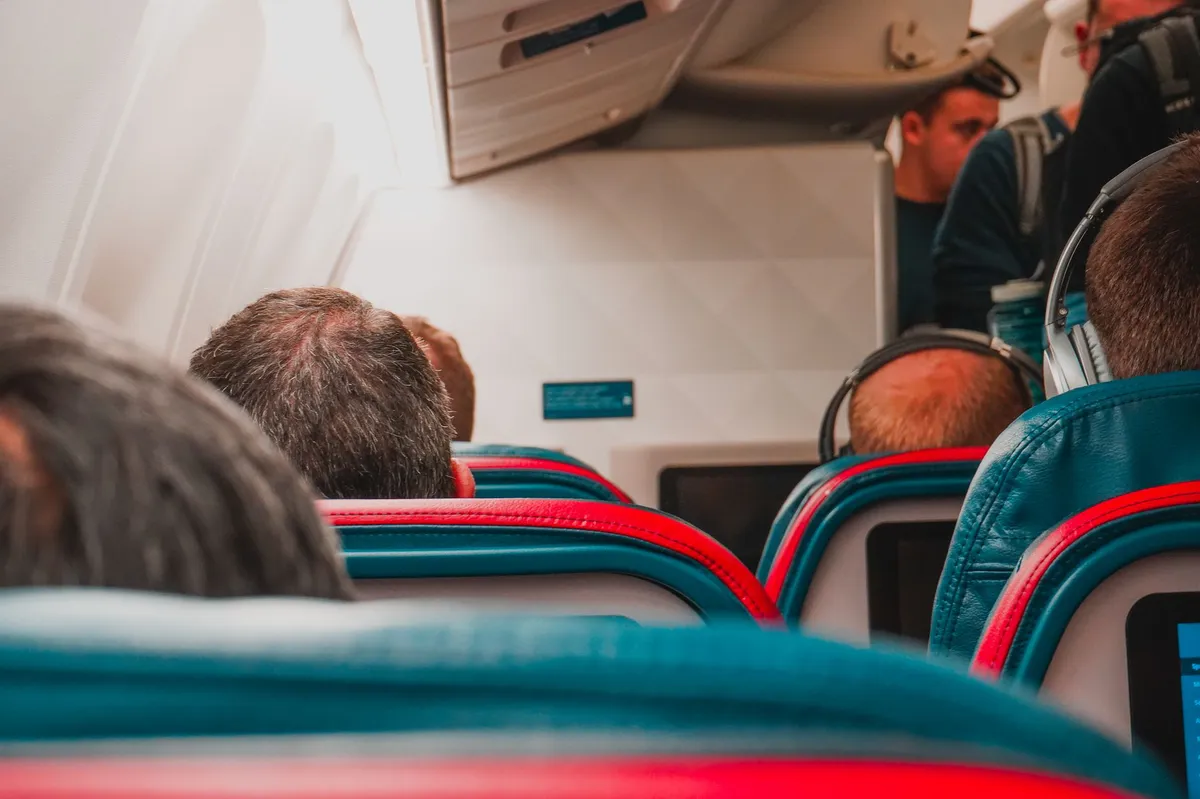 airplane interior with passengers