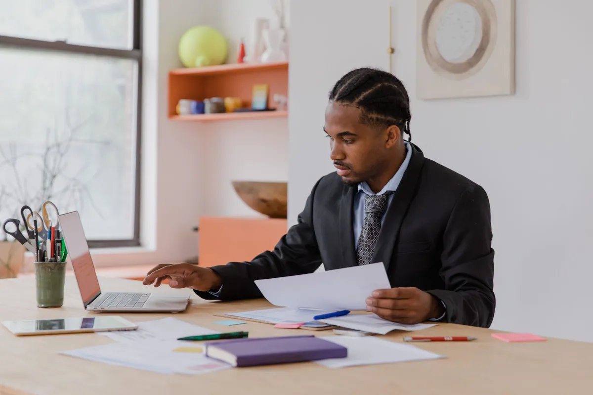 business owner with paperwork