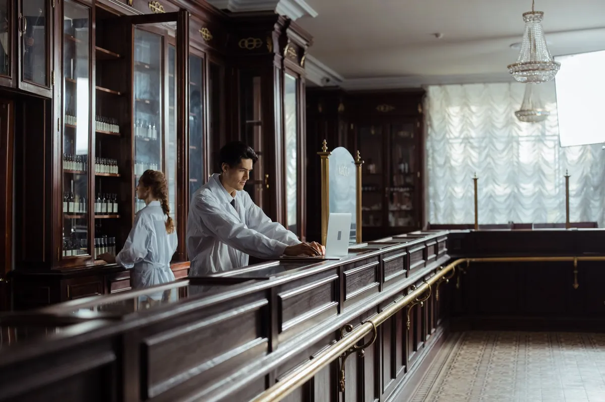 pharmacy counter with pharmacist