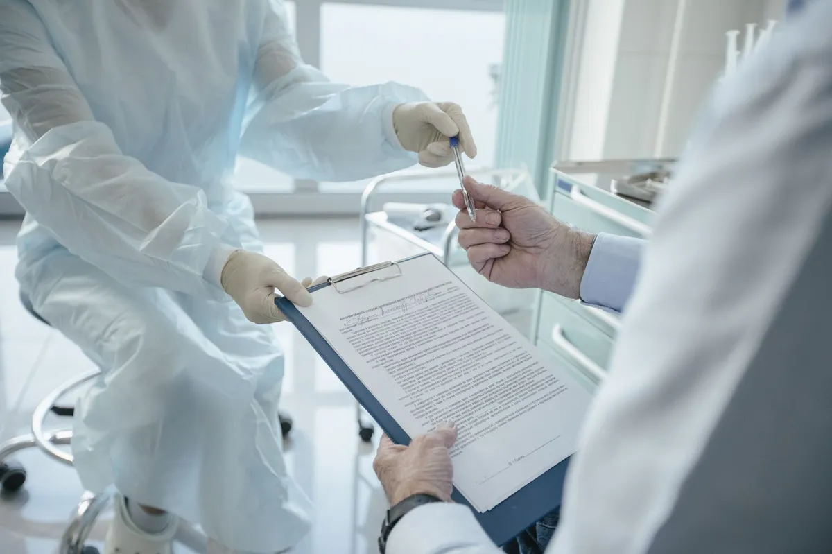 doctor discussing contract