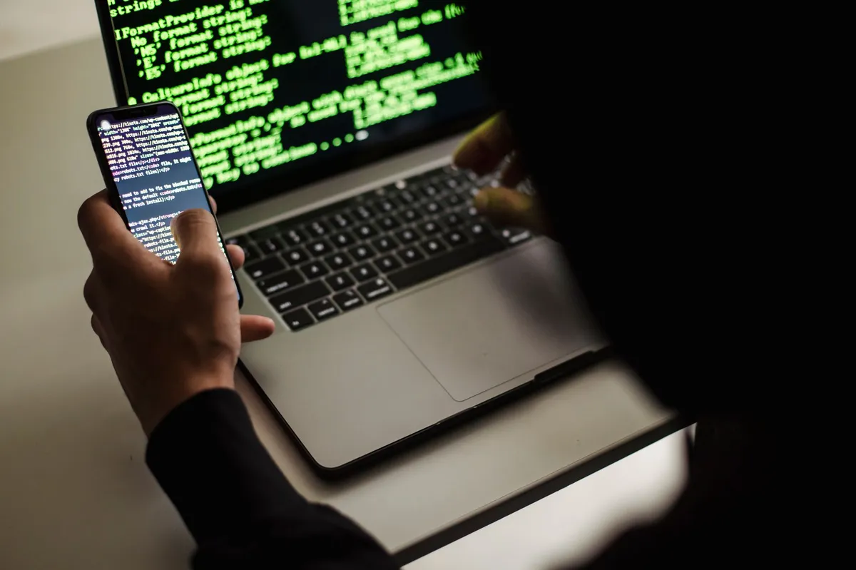 hacker using laptop