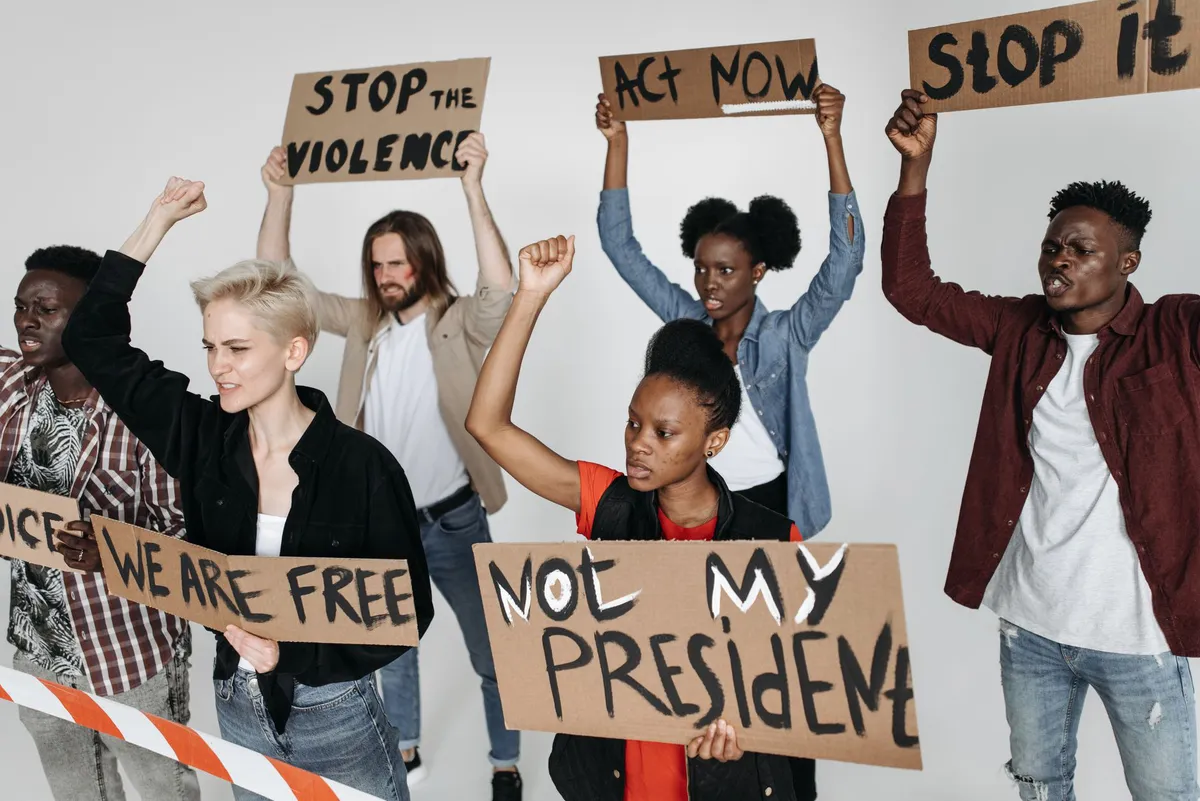 diverse group of people protesting