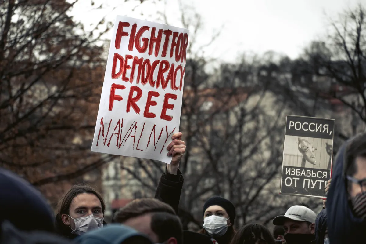protest sign with free speech slogan