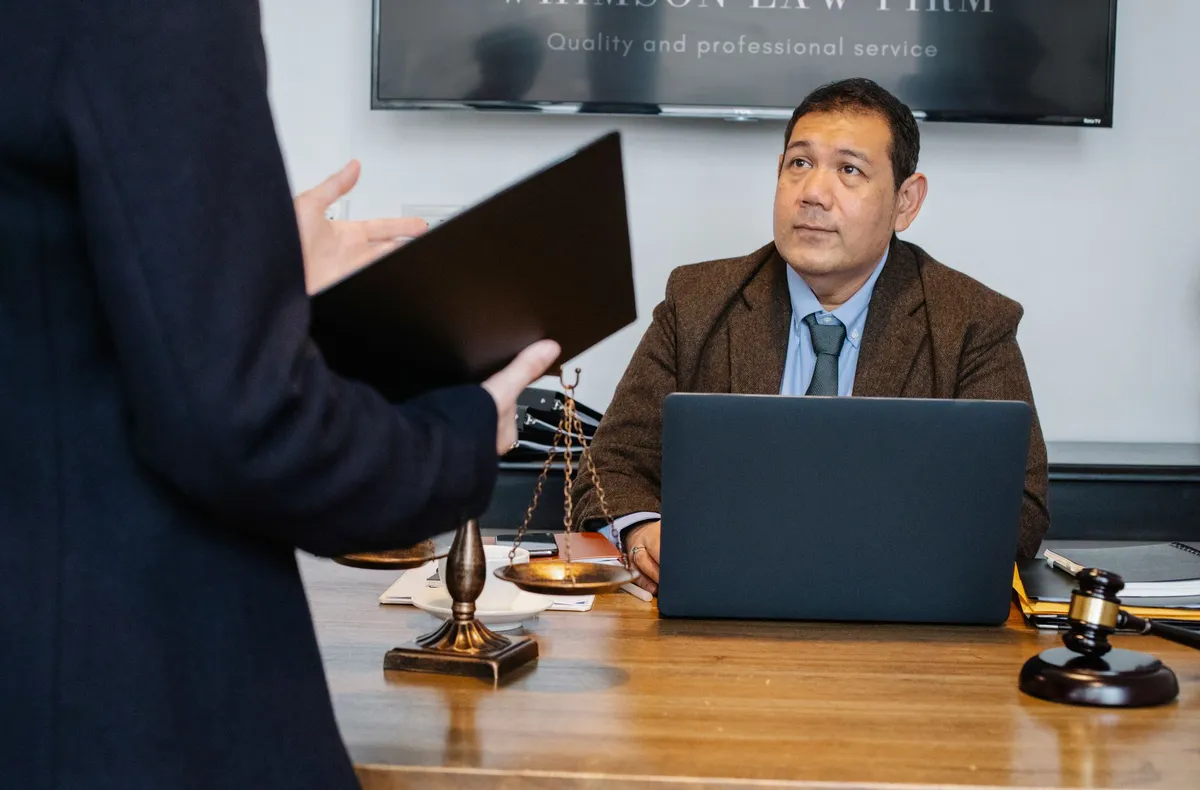 attorney discussing case in office