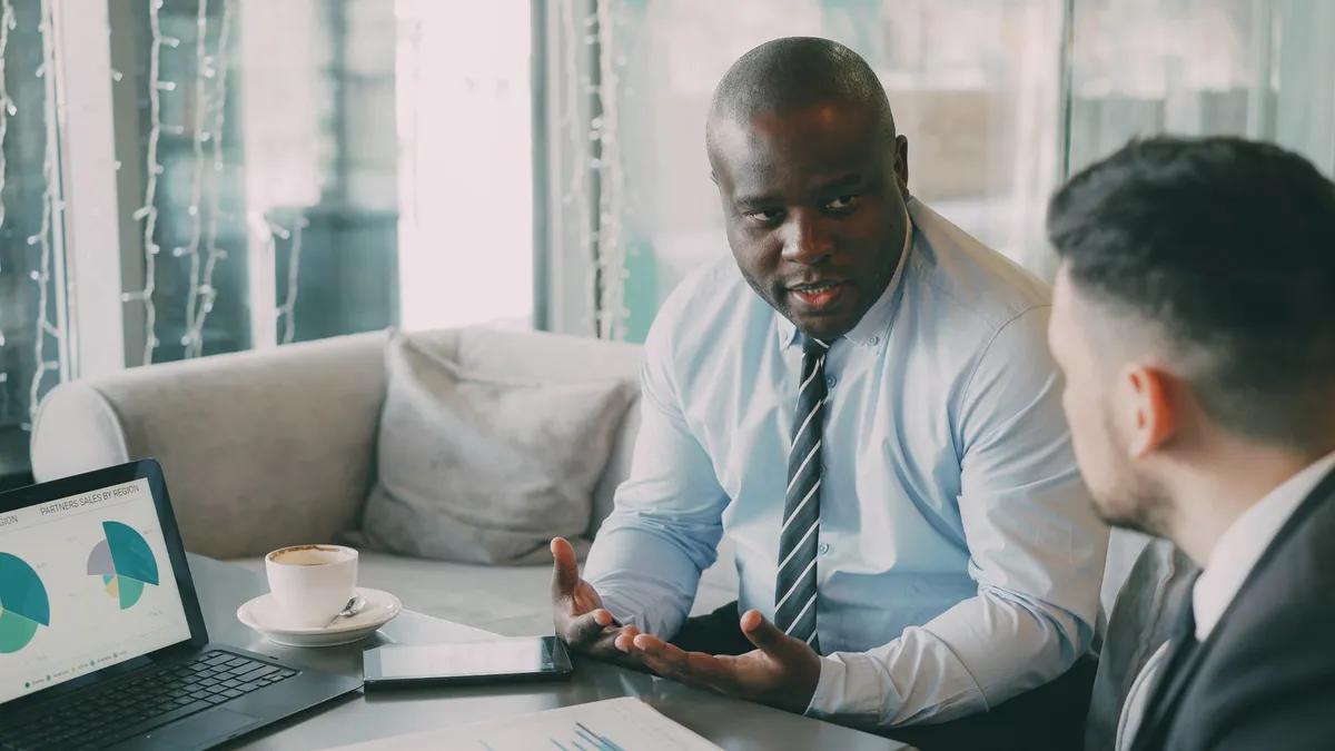 entrepreneur consulting with advisor