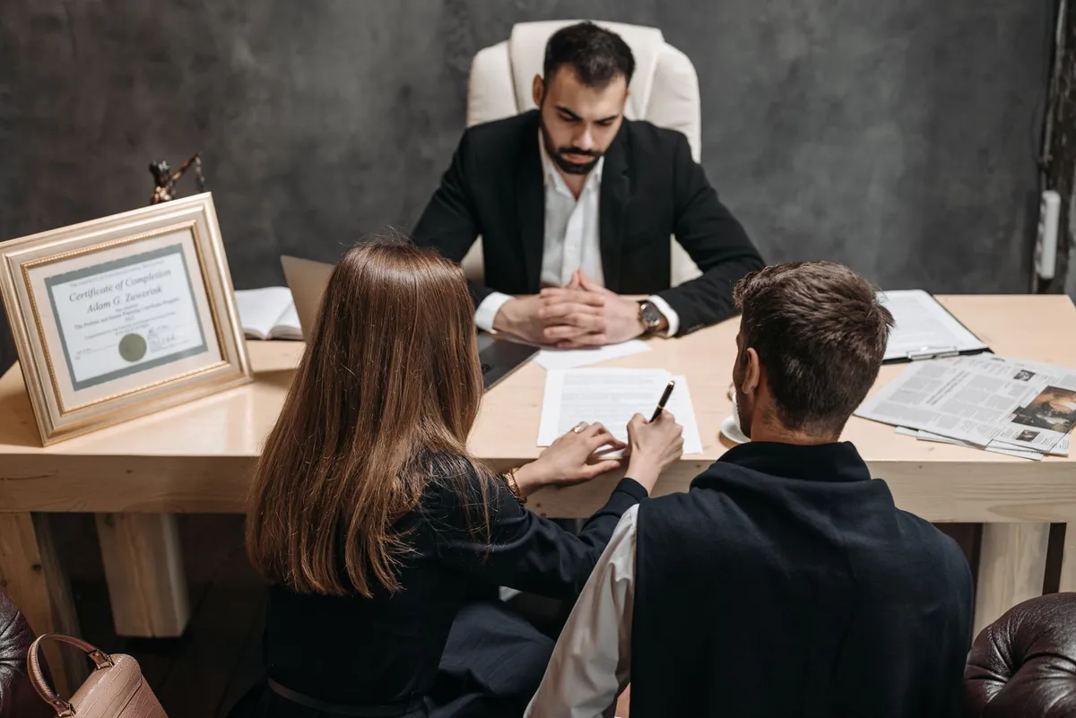 people discussing legal documents