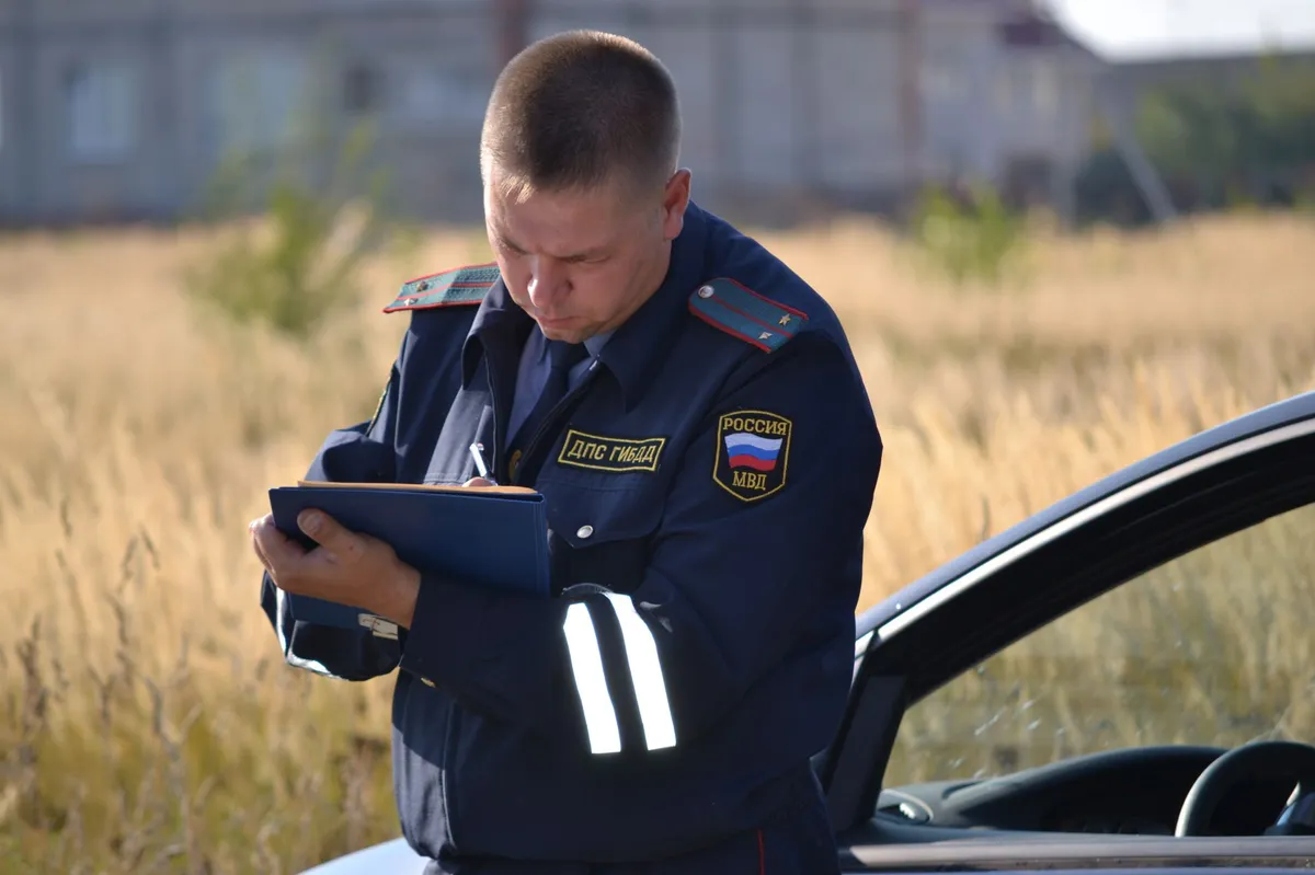 police officer writing accident report