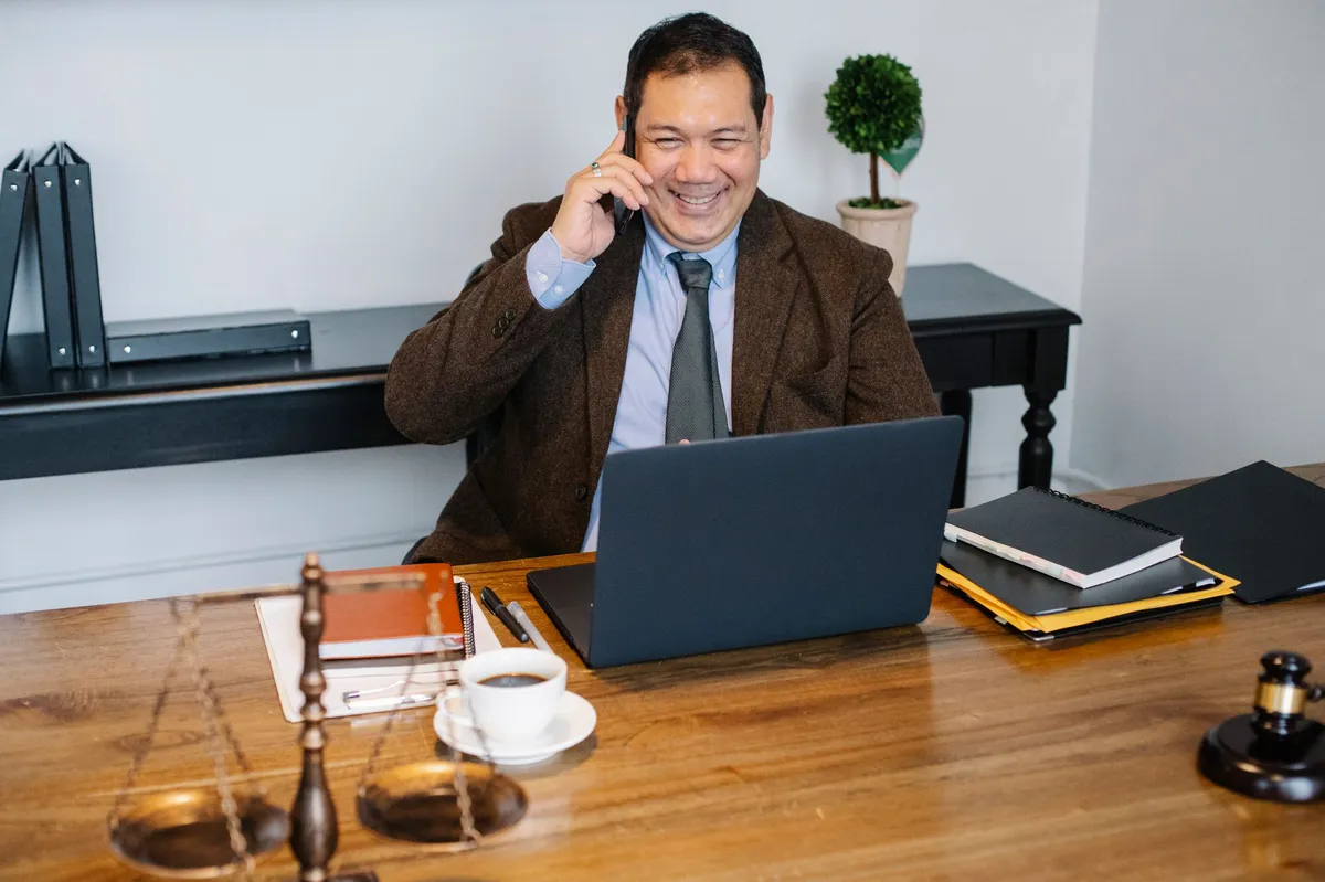 lawyer speaking on the phone