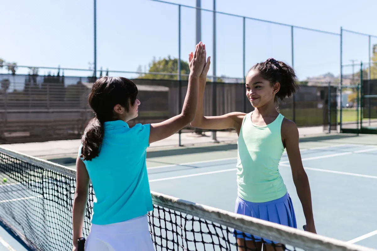 tennis players celebrating
