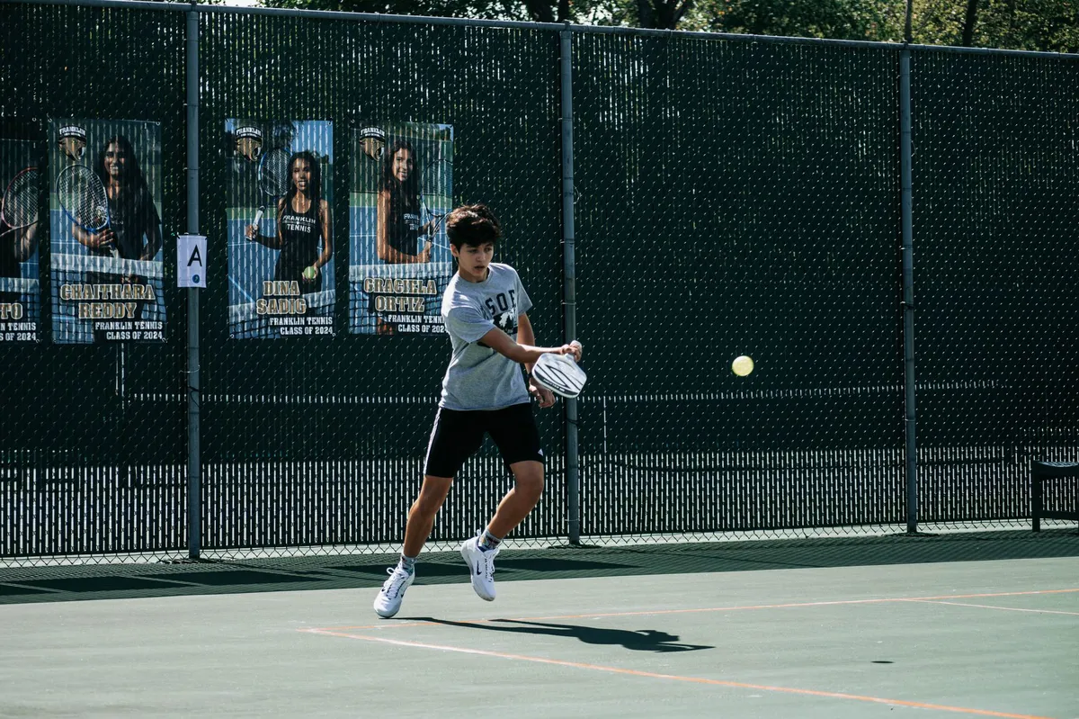 tennis players in action