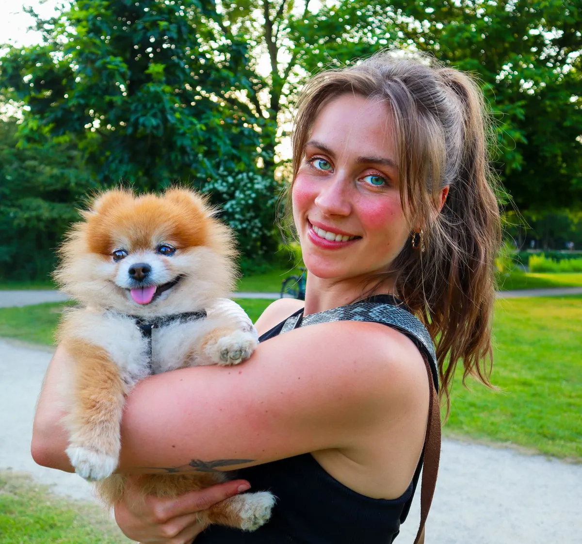 happy pet owner with raccoon