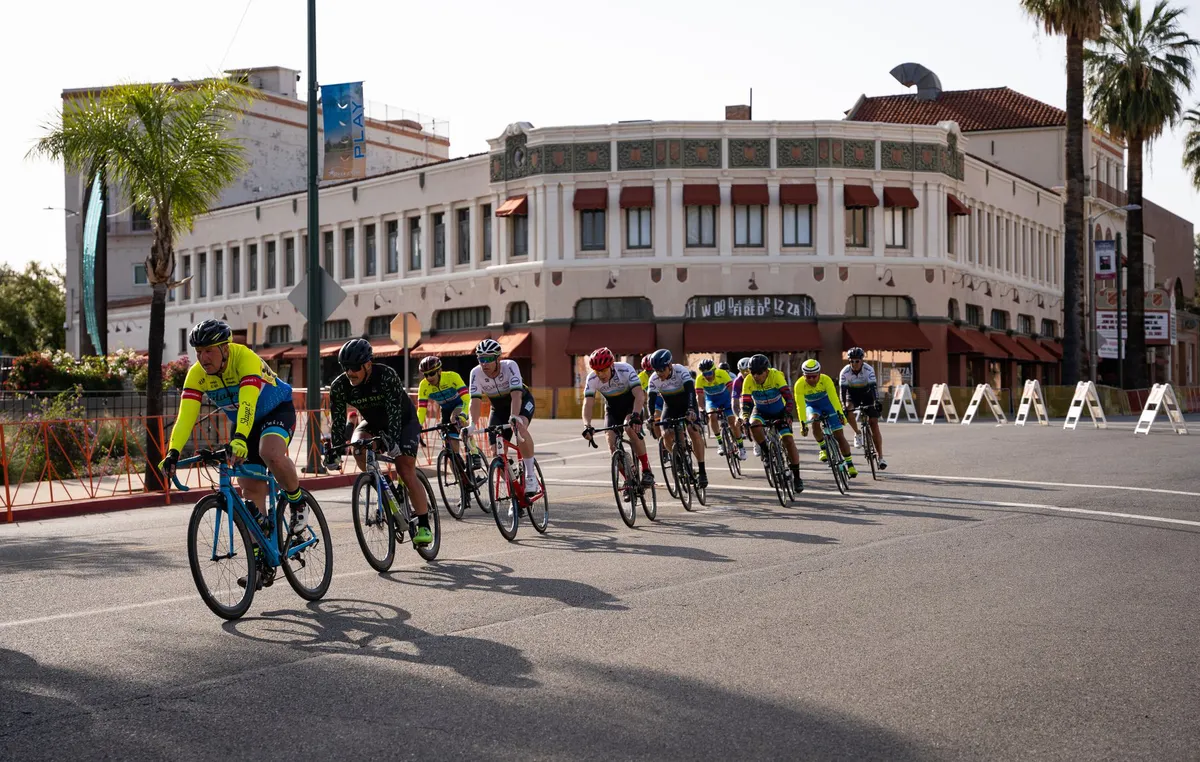 group of cyclists in a city