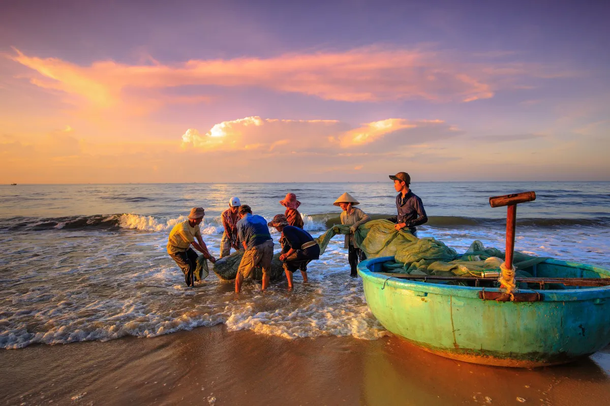 fishermen working at sea