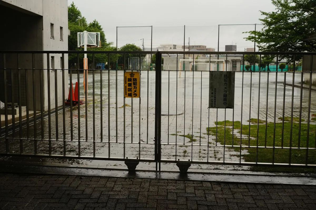 school entrance with sign