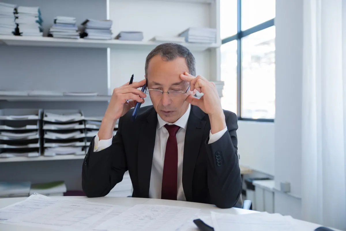 stressed lawyer at desk