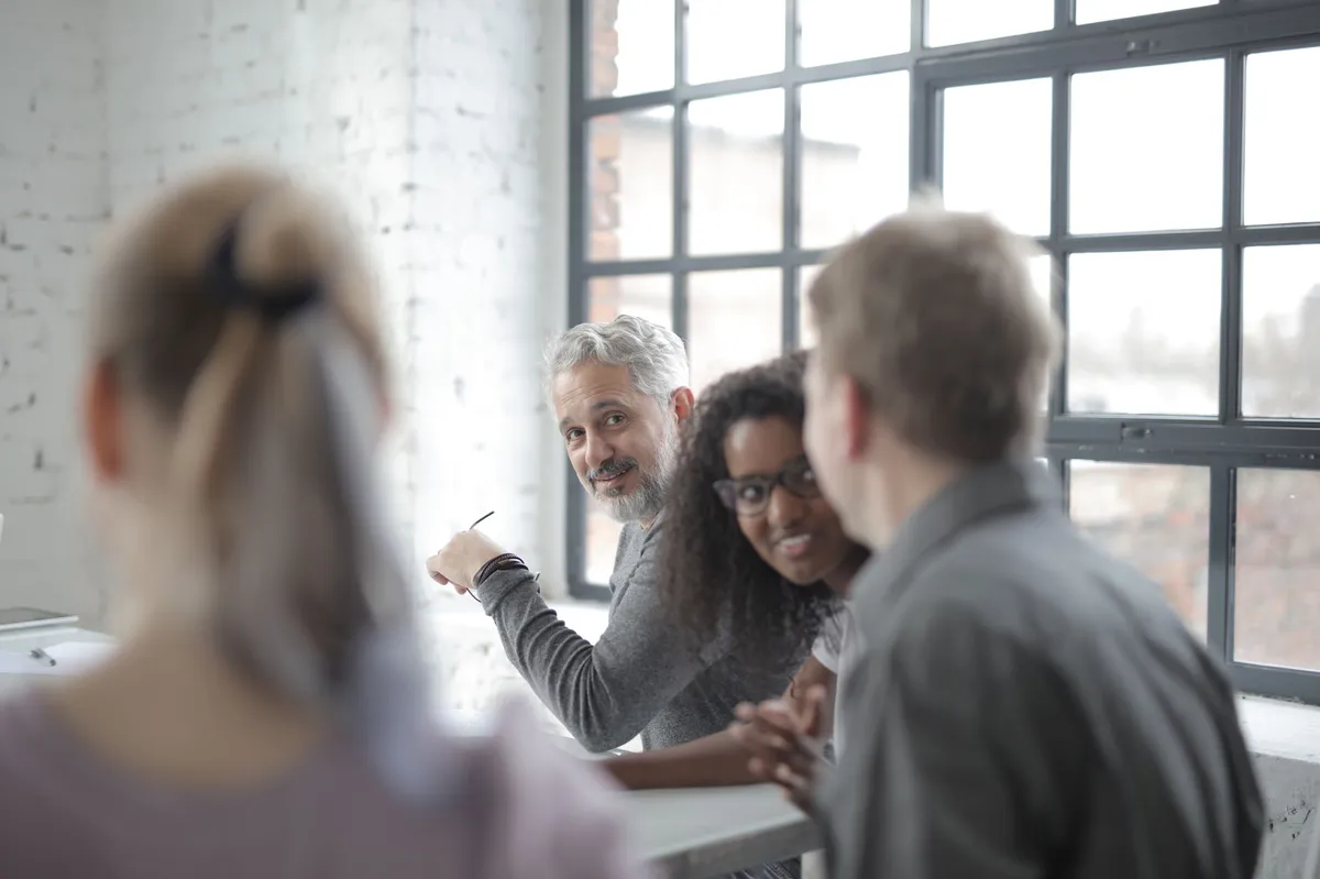 group of employees in meeting