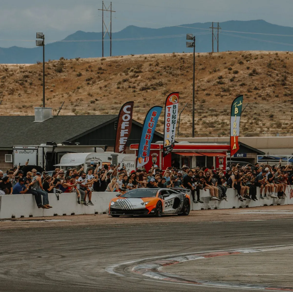 cheering racing fans