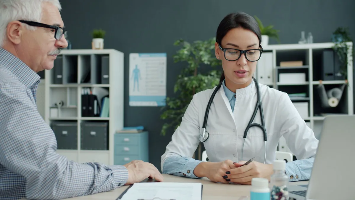 doctor consulting with patient
