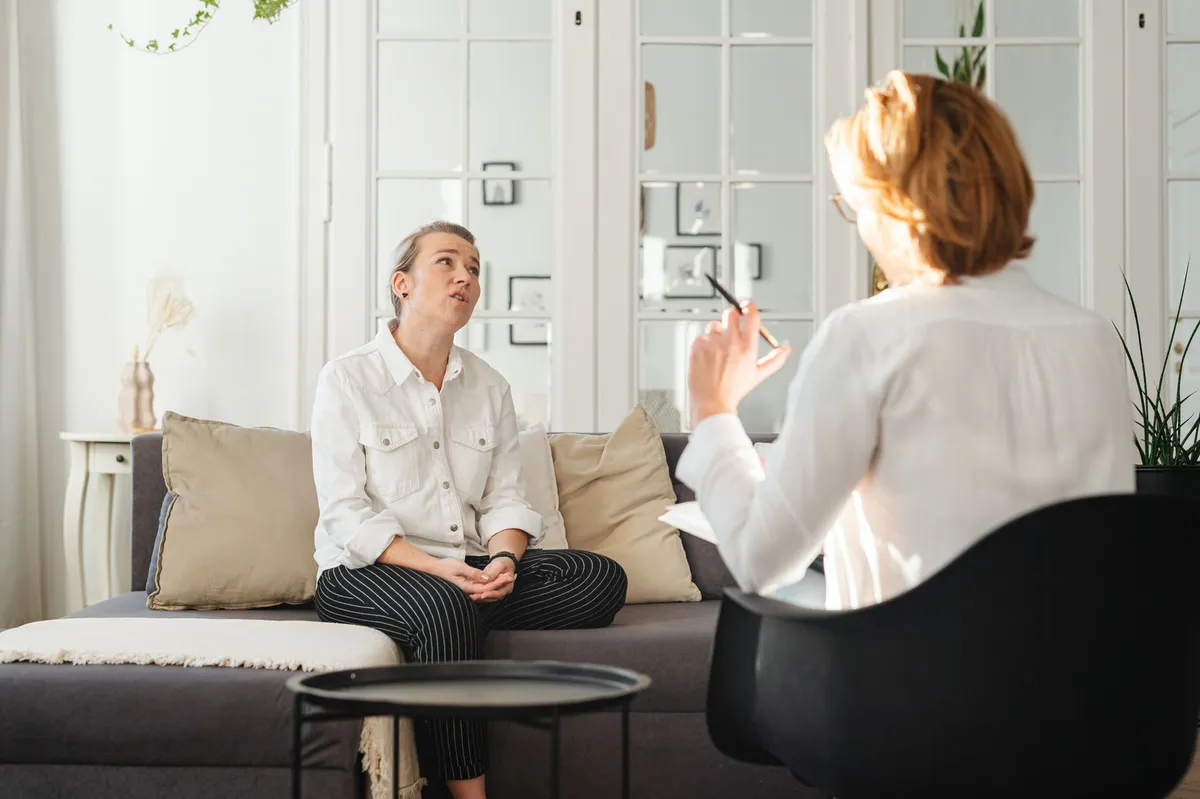 psychiatrist listening to patient