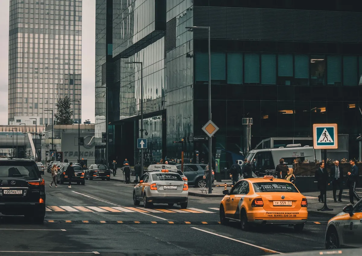 taxi cab on busy street