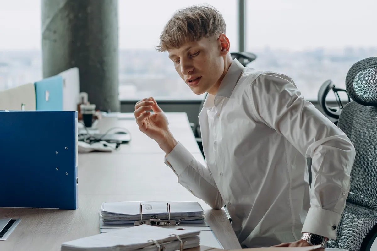 injured worker at desk