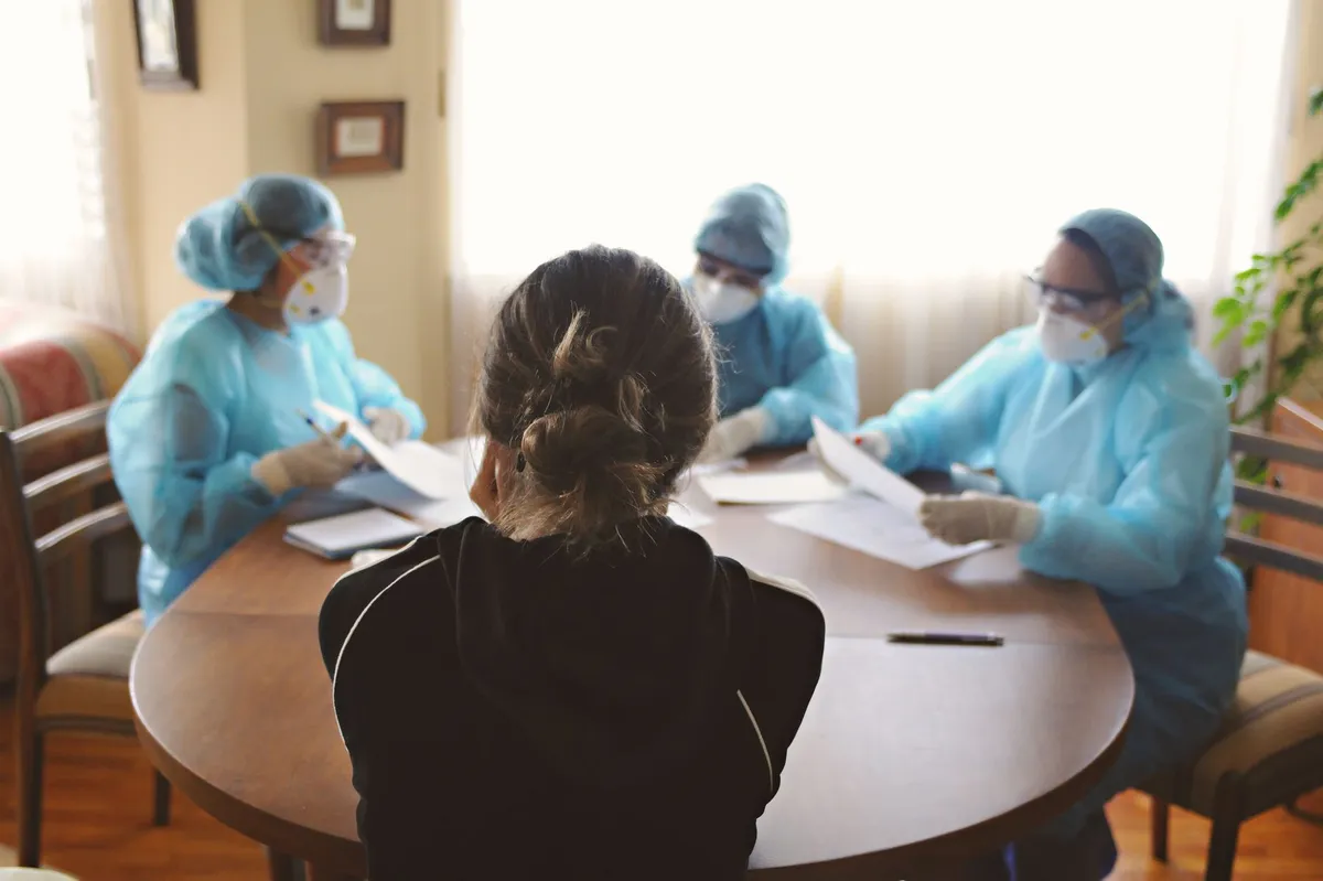 serious nursing home staff meeting