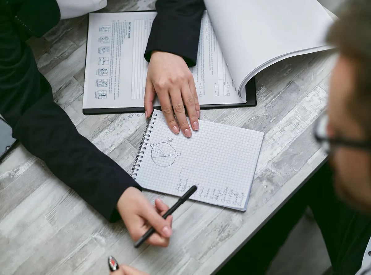business people analyzing contract